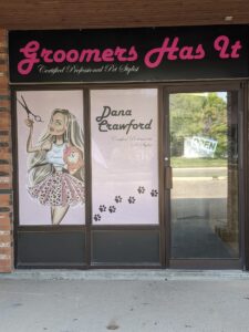 groomer has it logo